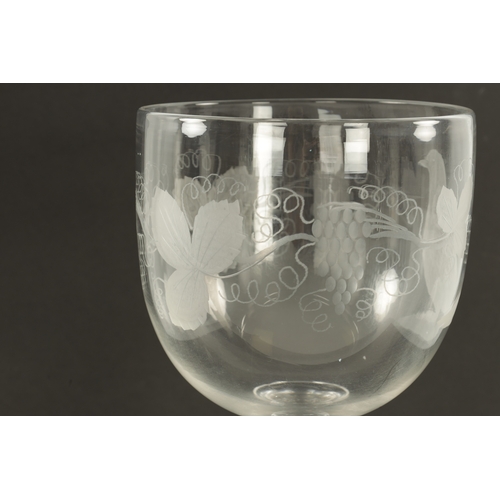 2 - AN OVERSIZED 19TH CENTURY GLASS ENGRAVED GOBLET the body decorated with grapevines and pigeon on kno... 