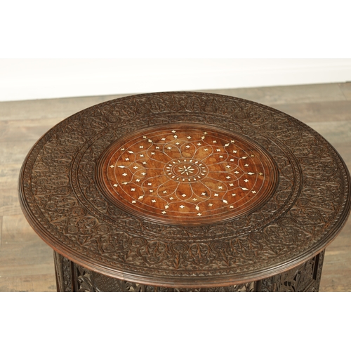 210 - A 19TH CENTURY ANGLO INDIAN CARVED HARDWOOD AND IVORY INLAID OCCASIONAL TABLE with geometric inlaid ... 