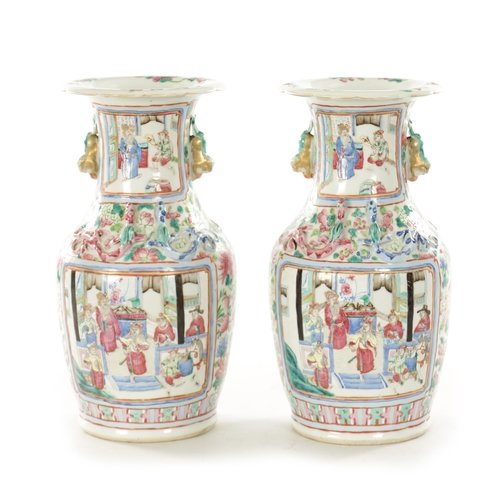 214 - A PAIR OF 19TH CENTURY CHINESE CANTONESE PORCELAIN VASES with famille rose colours depicting interio... 