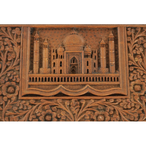 216 - A LATE 19TH CENTURY INDIAN SANDALWOOD BOX AND CARD CASE the shallow body profusely inlaid with leaf-... 