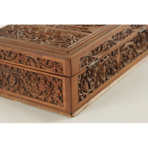 216 - A LATE 19TH CENTURY INDIAN SANDALWOOD BOX AND CARD CASE the shallow body profusely inlaid with leaf-... 