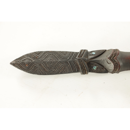 219 - A 19TH CENTURY NEW ZEALAND MAORI TAIAHA STAFF WITH CARVED JANUS HEAD with flattened tapered shaft an... 