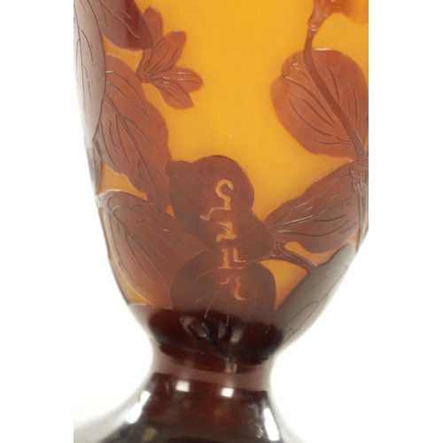 22 - A LARGE GALLE CAMEO GLASS VASE decorated with flowers and butterflies - signed (40cm high)