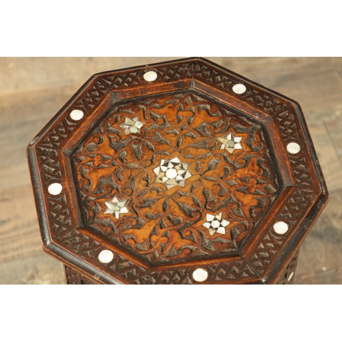 224 - A 19TH CENTURY OTTOMAN CARVED HARDWOOD AND MOTHER OF PEARL INLAID OCCASIONAL TABLE of octagonal shap... 