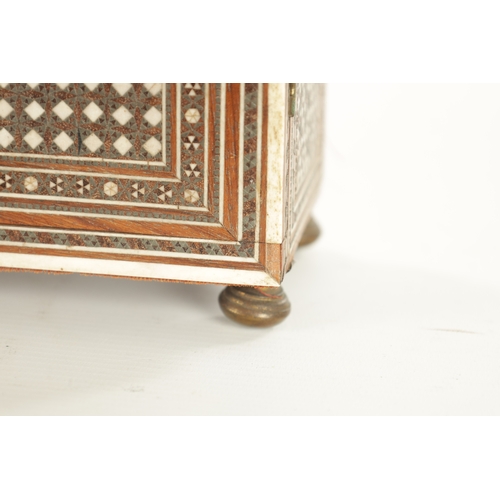 229 - A LATE 19TH CENTURY INDIAN MICRO MOSAIC TABLE CABINET the overhanging top above a two-door shelved i... 