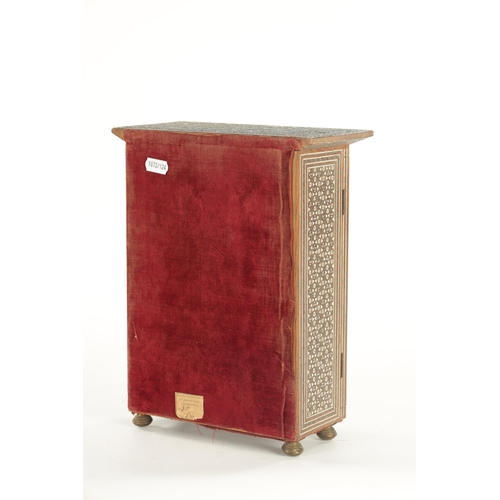 229 - A LATE 19TH CENTURY INDIAN MICRO MOSAIC TABLE CABINET the overhanging top above a two-door shelved i... 