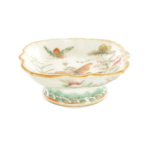 231 - A 19TH CENTURY CHINESE PORCELAIN FOOTED DISH OF SMALL SIZE decorated with coloured enamels highlight... 