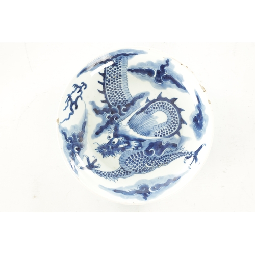 235 - AN 18TH/19TH CENTURY CHINESE BLUE AND WHITE PORCELAIN BOWL decorated with dragon amongst stylised cl... 