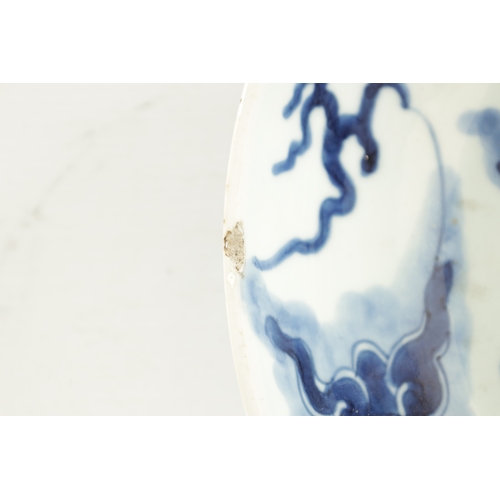 235 - AN 18TH/19TH CENTURY CHINESE BLUE AND WHITE PORCELAIN BOWL decorated with dragon amongst stylised cl... 