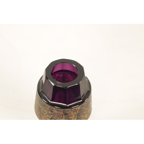 24 - AN EARLY 20TH-CENTURY PURPLE GLASS VIENNA SECESSIONIST VASE IN THE MOSER STYLE of faceted shaped for... 