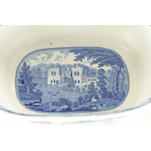 26 - AN EARLY 19TH CENTURY BLUE AND WHITE TRANSFER SOUP TUREEN decorated with country lake scenes, th int... 