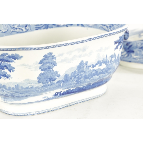 26 - AN EARLY 19TH CENTURY BLUE AND WHITE TRANSFER SOUP TUREEN decorated with country lake scenes, th int... 