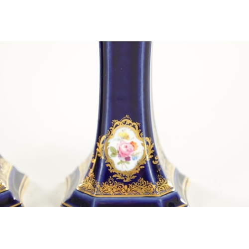 27 - A PAIR OF LATE 19TH CENTURY MEISSEN SPILL VASES of square tapered royal blue and scrolled gilt desig... 