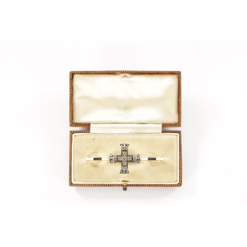281 - AN 18CT GOLD MILITARY DIAMOND ENAMEL BROOCH The cross terminated with four crowns on a blue and whit... 