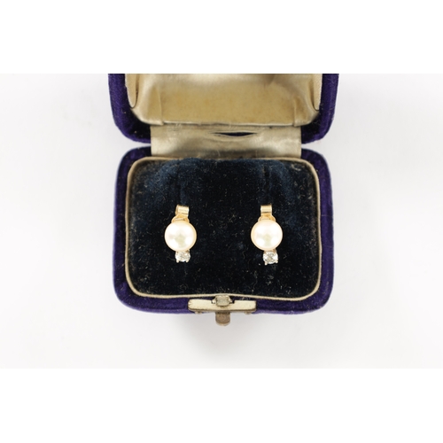 285 - A PAIR OF 9CT GOLD PEARL AND DIAMOND EARRINGS (Each pearl measures 7mm diameter)
