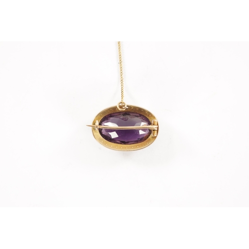 286 - A GOLD METAL AMETHYST AND PEARL BROOCH With large oval cut stone with a hinged pin and safety chain.... 