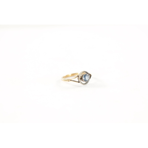 295 - AN ANTIQUE 18CT GOLD SAPPHIRE RING The 3/4 carat sapphire in a halo setting with white gold surround... 