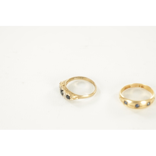 297 - TWO LADIES GOLD AND SAPPHIRE RINGS An 18ct gold ring with diamond and sapphires on a claw setting, t... 