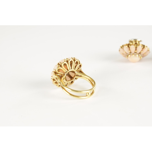 299 - AN 18CT GOLD PINK CORAL AND DIAMOND TWO SET RING AND EARRINGS With cabochon centre coral surrounded ... 
