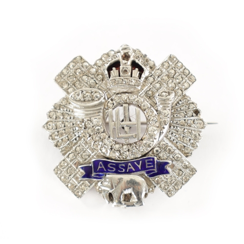 303 - A HIGHLAND LIGHT INFANTRY WHITE GOLD GEM SET AND ENAMEL MILITARY BROOCH Total weight app. 9.4g (28mm... 