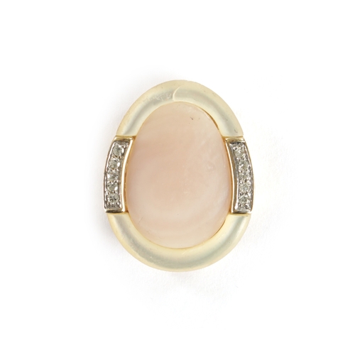 304 - A 9CT GOLD MOUNTED MOTHER OF PEARL AND DIAMOND PENDANT of egg shape with pierced gold frame, total w... 