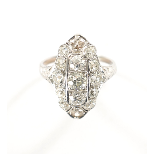 307 - A LADIES ART DECO 18CT WHITE GOLD DIAMOND RING having fifteen cushion cut diamonds app. 3ct and of g... 