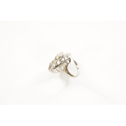 307 - A LADIES ART DECO 18CT WHITE GOLD DIAMOND RING having fifteen cushion cut diamonds app. 3ct and of g... 