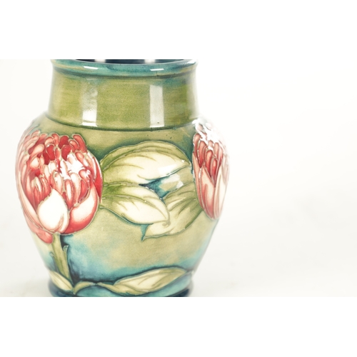 31 - A WILLIAM MOORCROFT MINIATURE 'WARATAH' CABINET VASE signed in blue 'WMoorcroft' and 'Potter to HM t... 