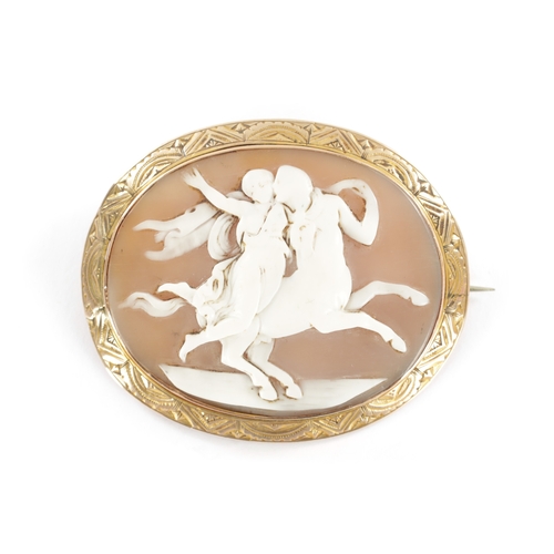 313 - A LARGE 19TH CENTURY GOLD MOUNTED CAMEO BROOCH depicting Nessus carrying off Dejanire, total weight ... 