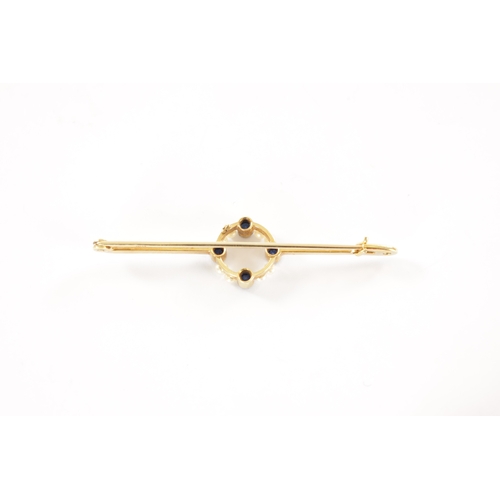 320 - A 15CT GOLD SAPHIRE AND PEARL BAR BROOCH Total weight app. 3.7g. (58mm overall)