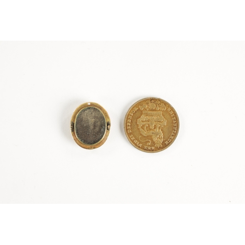 321 - A19TH CENTURY MINIATURE ENAMEL PORTRAIT OF AN OFFICER Together with a Regency silver-gilt coin. (2) ... 