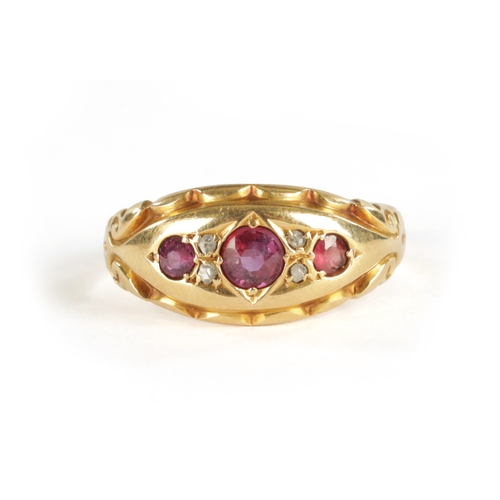 322 - AN EDWARDIAN 18CT GOLD RUBY AND DIAMOND RING Total weight app. 3.5g. Ring size N.