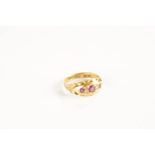 322 - AN EDWARDIAN 18CT GOLD RUBY AND DIAMOND RING Total weight app. 3.5g. Ring size N.