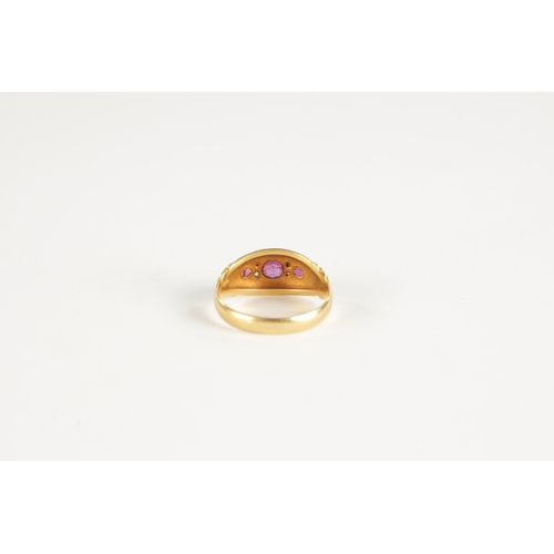 322 - AN EDWARDIAN 18CT GOLD RUBY AND DIAMOND RING Total weight app. 3.5g. Ring size N.