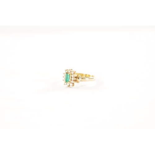 329 - AN 18CT GOLD EMERALD AND DIAMOND RING With baguette cut emerald surrounded by twelve brilliant cut d... 