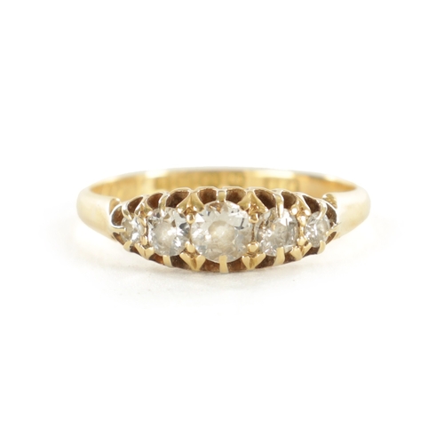 333 - A LADIES VINTAGE 18CT GOLD FIVE STONE DIAMOND RING Graduating in size on claw setting, total weight ... 