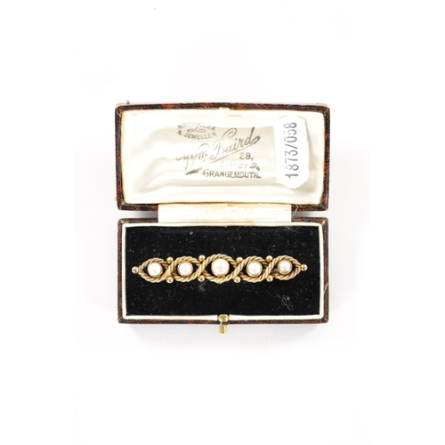 335 - A 15CT GOLD AND PEARL BAR BROOCH With rope twist frame, total weigh app. 6.8g. In a velvet-lined box... 