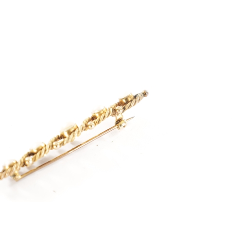 335 - A 15CT GOLD AND PEARL BAR BROOCH With rope twist frame, total weigh app. 6.8g. In a velvet-lined box... 