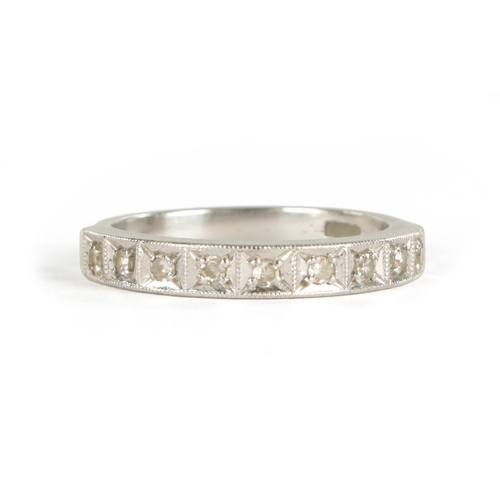 343 - AN 18CT WHITE GOLD NINE STONE DIAMOND ETERNITY RING with flush beaded setting, total weight app. 3.4... 