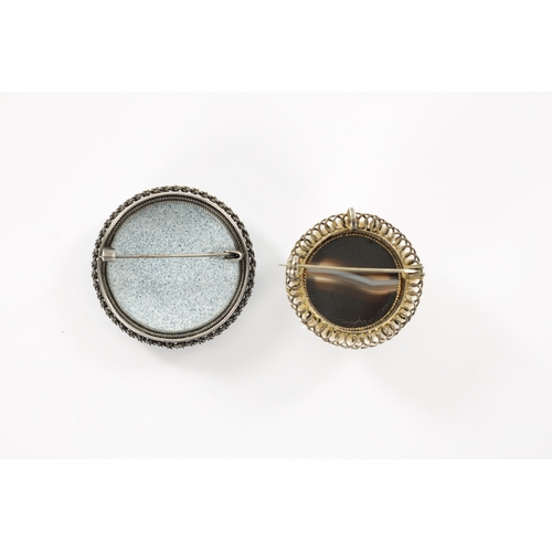 356 - TWO EARLY 20TH CENTURY SILVER BROOCHES one with enamel floral decoration, the other with agate caboc... 