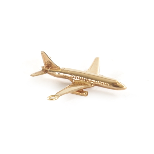 357 - A 9CT GOLD BOEING 737 PENDANT modelled as an aircraft with loop suspension, hallmarked P & M, circa ... 