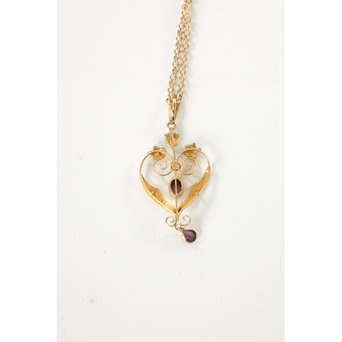 361 - AN ART NOUVEAU 9CT GOLD PEARL AND AMETHYST PENDANT ON MATCHING CHAIN With scrollwork frame and pear ... 