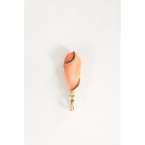 364 - A CORAL, DIAMOND AND 18CT GOLD PENDENT The coral pear drop has a gold band set with brilliant-cut di... 