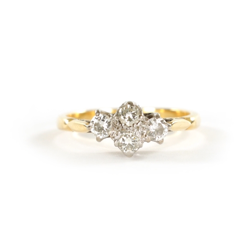 365 - AN 18CT GOLD FOUR STONE DIAMOND RING Total wight app. 3.7g, ring size M/N