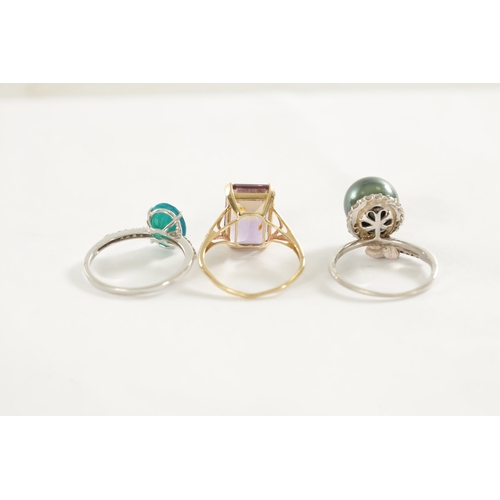 369 - A COLLECTION OF THREE 9CT GOLD LADIES RINGS comprising of a 9ct white gold and pearl ring on a diamo... 