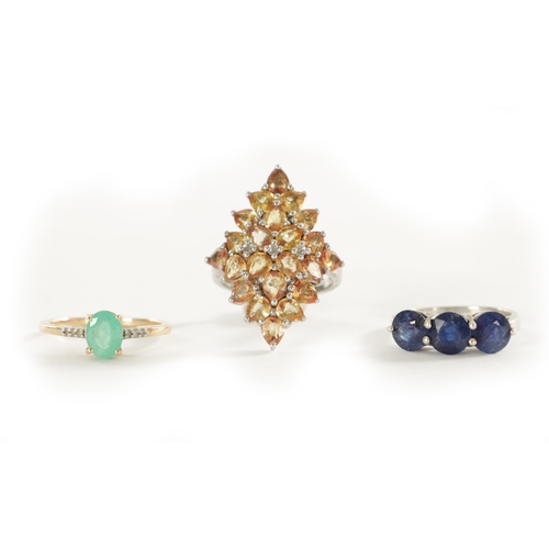 374 - A COLLECTION OF THREE LADIES RINGS, a three-stone sapphire and silver ring with certificate, 5.94ct,... 