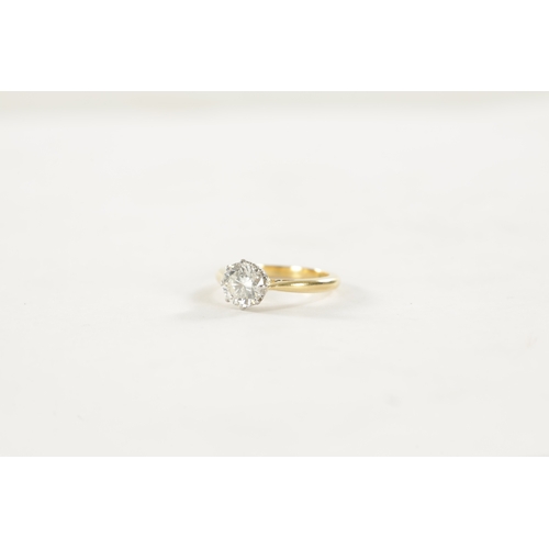 380 - A LADIES 18CT GOLD DIAMOND SOLITAIRE RING the 1.50ct diamond set in platinum, VS1, colour G/H. Ring ... 