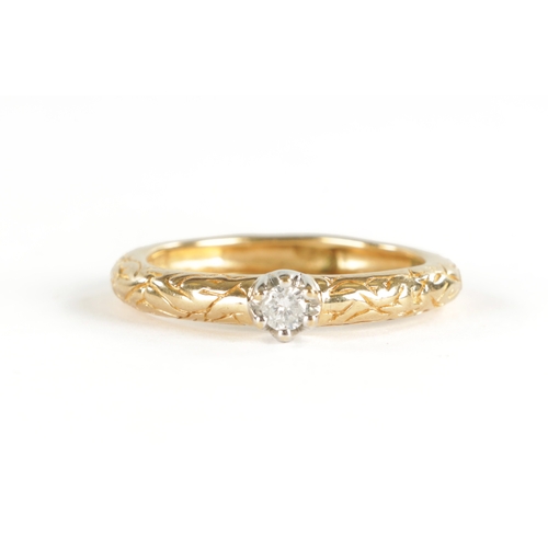 383 - A 9CT GOLD DIAMOND SOLITAIRE RING with white gold setting and engraved shank, total weight app. 2.7g... 