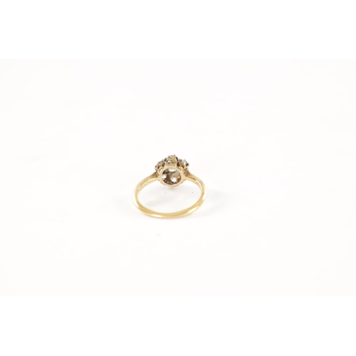 386 - AN 18CT GOLD SEVEN STONE DIAMOND DAISY RING, total weight app. 2.3g, ring size J/K.