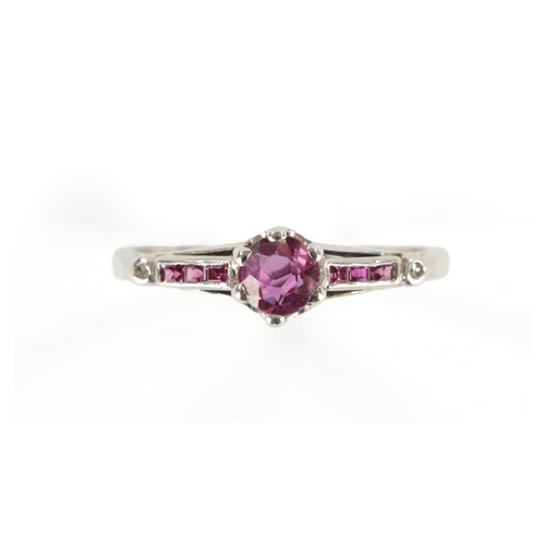 388 - AN 18CT WHITE GOLD RUBY AND DIAMOND RING. Total weight app. 2.3g, ring size M/N